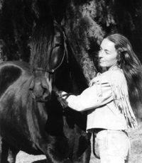 Barbara Anne Dunn with El Despejo, her Peruvian Paso - the Dark Horse of DarkHorse Ranch